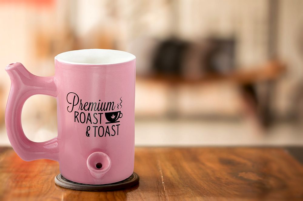 Pink roast & Toast mug with black logo